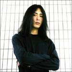 Seji Kakuzaki, Gitarre, Gesang.